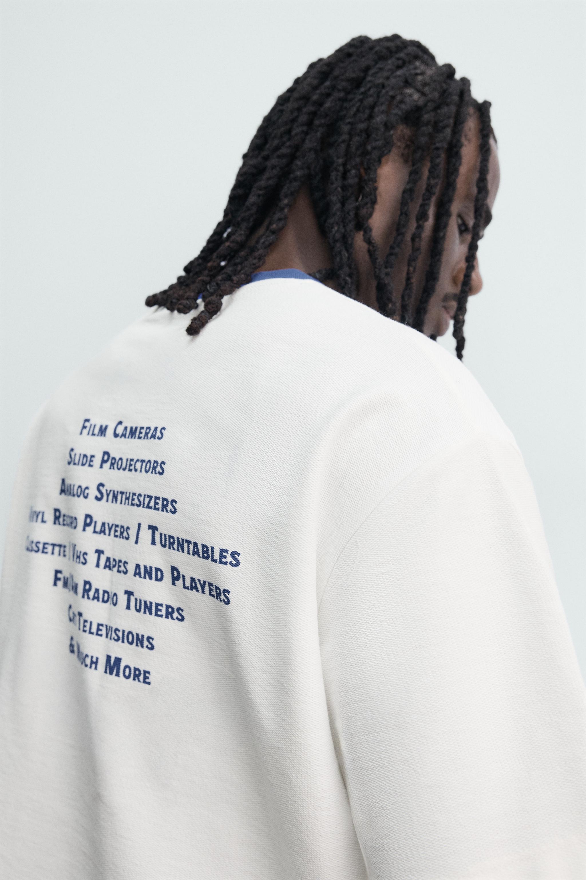 CONTRASTING PRINT TERRY RELAXED FIT SWEATSHIRT